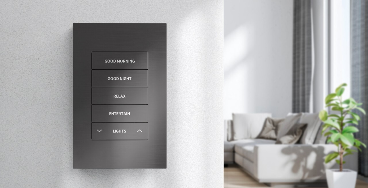 Crestron Horizon lighting keypad on a white wall in a modern living room, installed by Graytek in Metro Vancouver